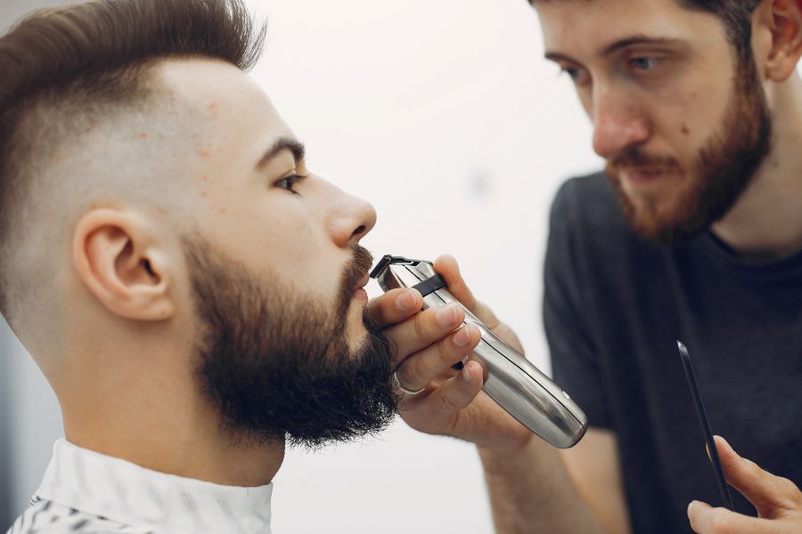 man getting a trim from a barber 2026 01 07 05 47 55 utc
